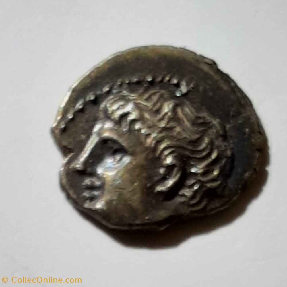 Marseille obole Tete Apollon a g (pompee) R/Roe avec rayons -121-82 D8.8 P 0.54g MHM 31 monnaie antique jc gauloise marseille obole tete apollon a g pompee r roe avec rayons 121 82 d8 8 p 0 54g mhm 31