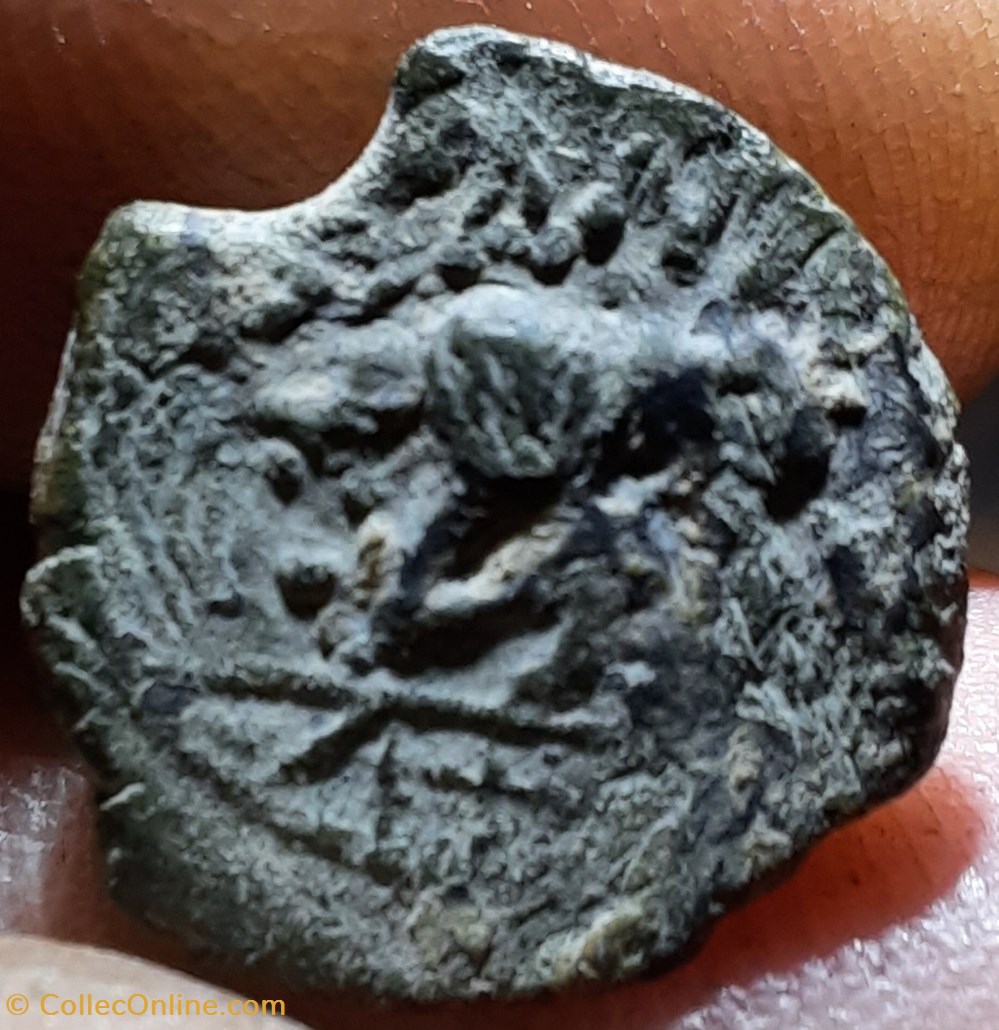 Marseille ou imitation vallee du rhone A/Tete Apollon a d R/Taureau a g D14.1 P.75g REF? monnaies antiquite av jc celtes marseille ou imitation vallee du rhone a tete apollon a d r taureau a g d14 1 p 75g ref