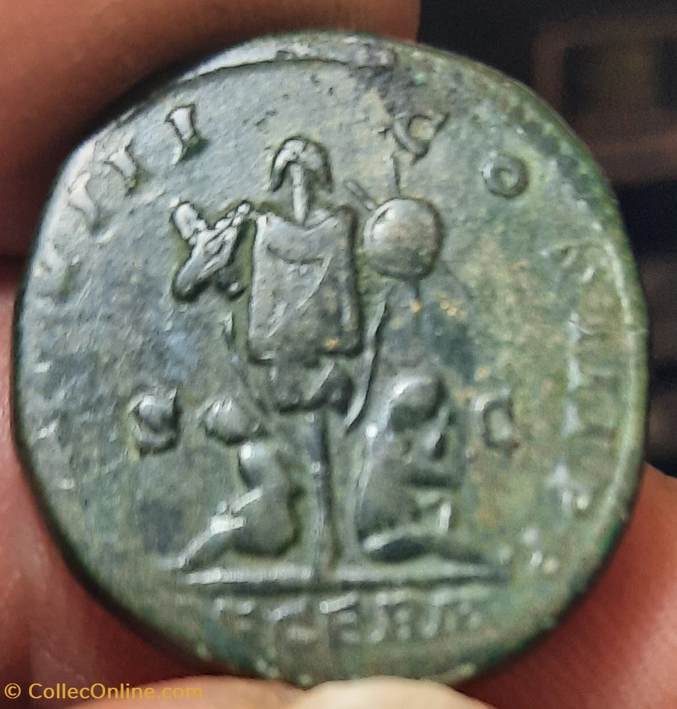 monnaie antiquite av jc ap romaine republicaine imperiale marc aurele a tete radiee a d r trophee d armes d23 8 p 11 47g c 157 rcv 5024 ric1179