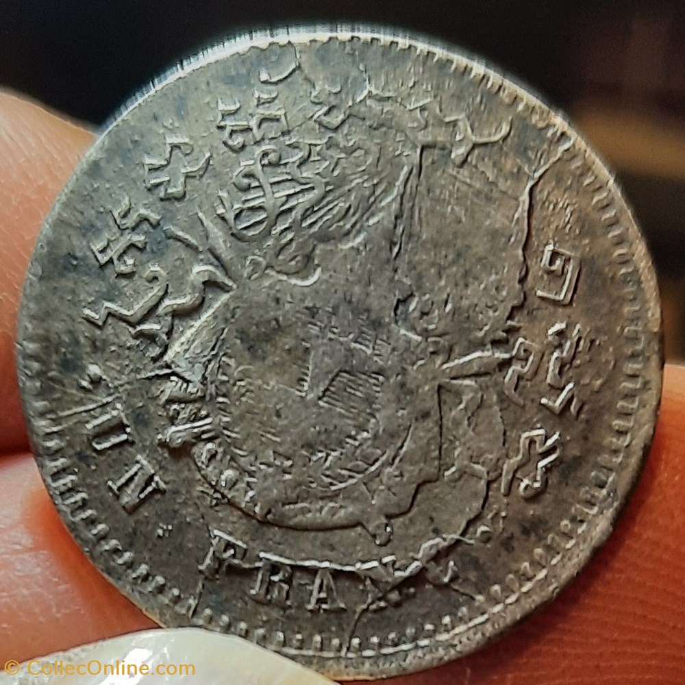 Norodom 1° A/ Tete nue a g R/ Ecu armes du Cambodge D23.5 P 3.96g Lec 61 monnaies monde norodom 1 a tete nue a g r ecu armes du cambodge d23 5 p 3 96g lec 61