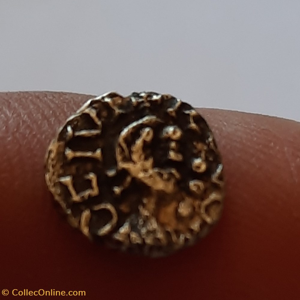 Merovingienne Rouen ? A / Tete a d 4 globules R/Croix sur globule D10.7 P1.21g ref indeterminee monnaies france merovingiennes merovingienne rouen a tete a d 4 globules r croix sur globule d10 7 p1 21g ref indeterminee