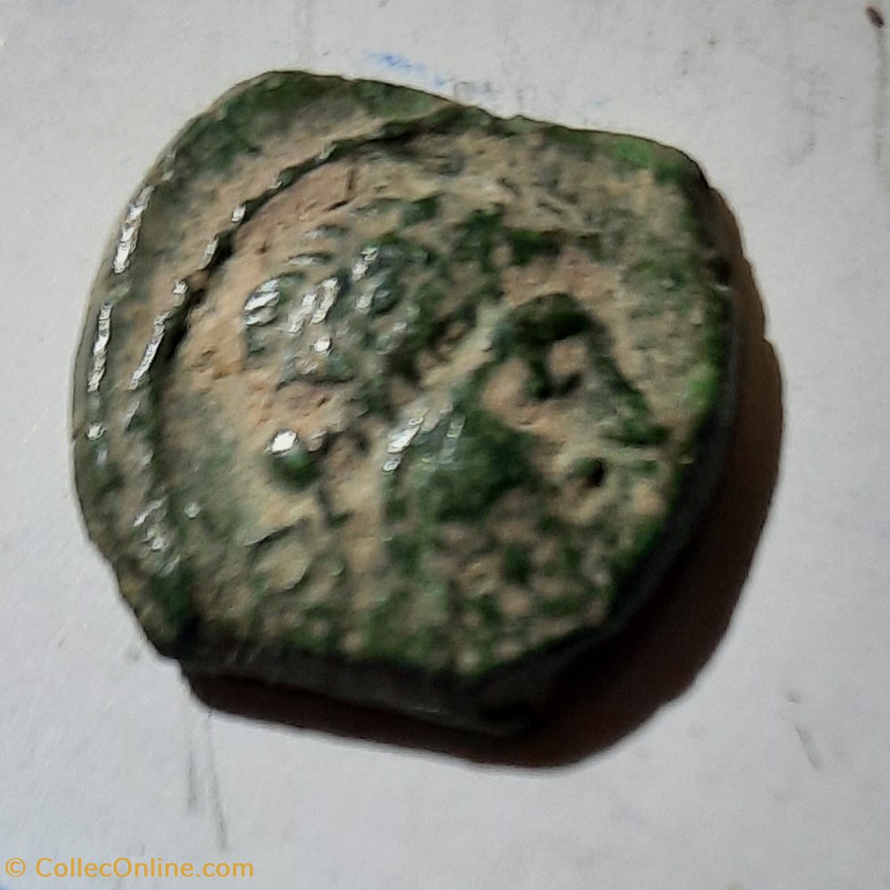 KPIEEOC / PB . A / Tete a d . R/ Taureau sur ligne de terre -100-50 D2.15 P 1.98g Feugere PBI 48 monnaie antique av jc ap gauloise kpieeoc pb a tete a d r taureau sur ligne de terre 100 50 d2 15 p 1 98g feugere pbi 48