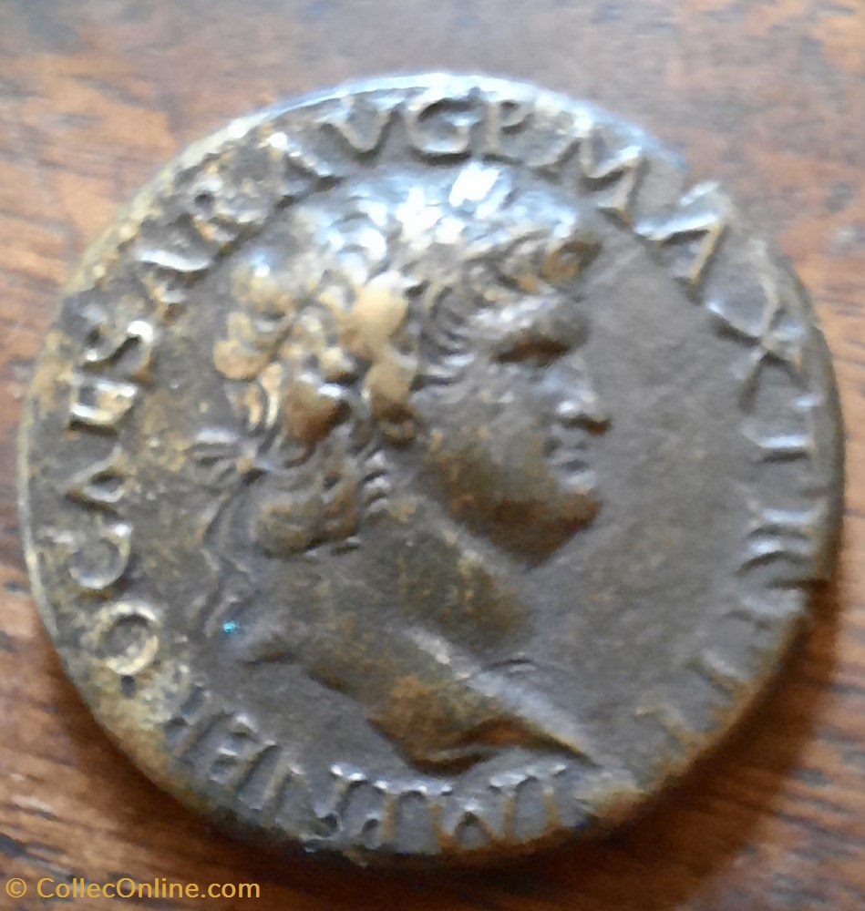 Neron A/Tete lauree a d R/Securite assise a d D28.5 P12.81 RCV1968 C 325 RIC 597 monnaie antique av jc ap romaine republicaine imperiale neron a tete lauree a d r securite assise a d d28 5 p12 81 rcv1968 c 325 ric 597