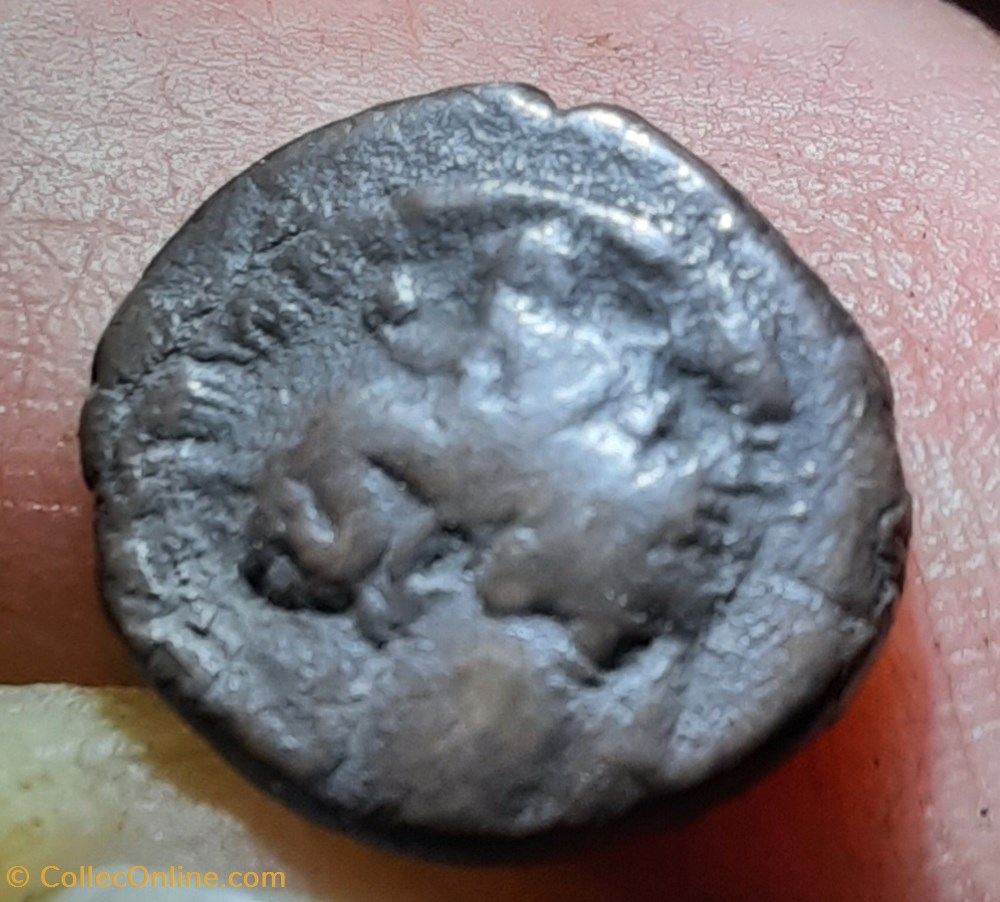 monnaies antiquite av jc ap grecques lucanie thurium a tete athnea a d r taureau exergue poisson 350 300 d11 6 p1 12g ans1139