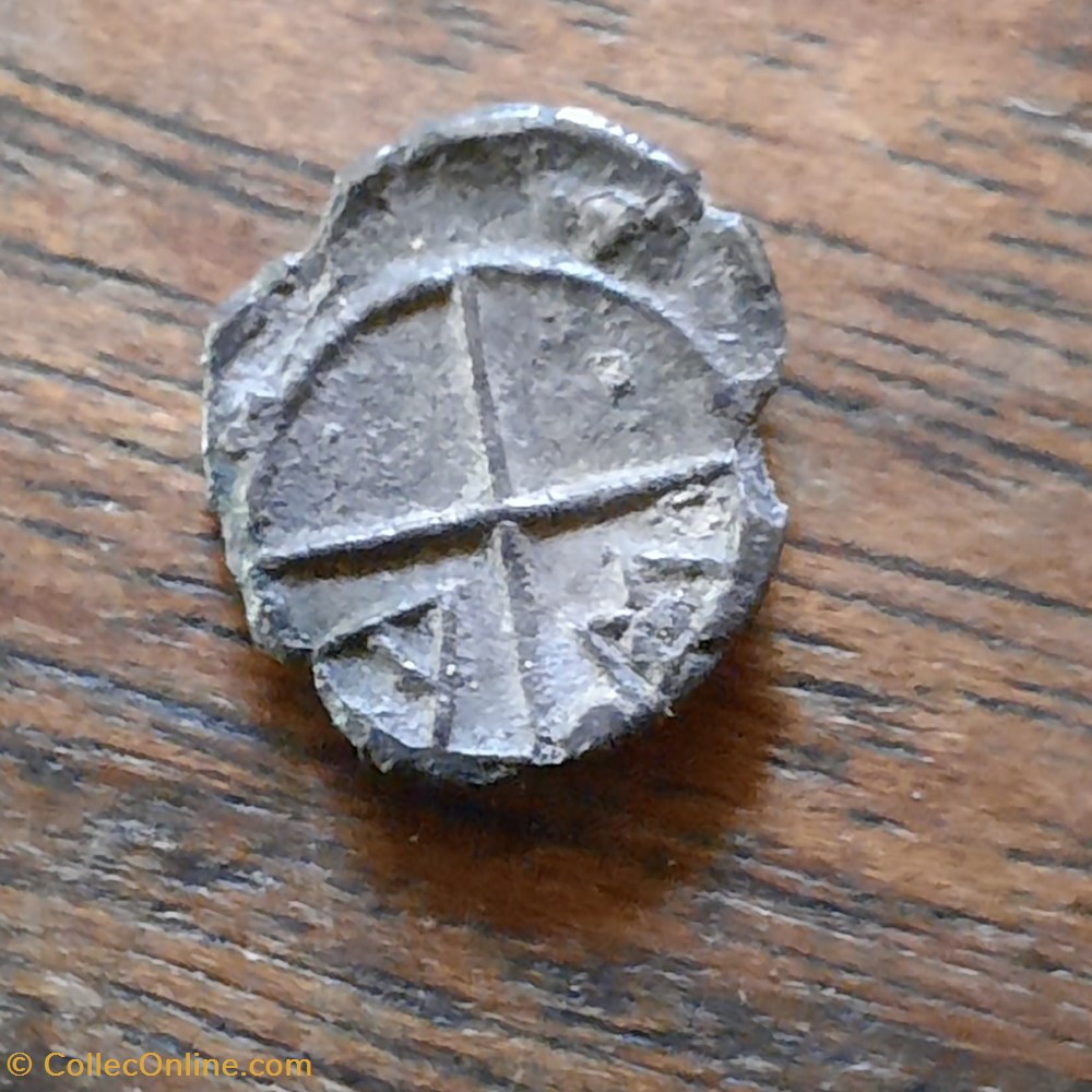 Marseille Imitation Salyens A/Tete a g R/Roue AM -1°Siecle D10 P 0.47g Feugere OBP28 monnaie antique av jc ap gauloise marseille imitation salyens a tete a g r roue am 1 siecle d10 p 0 47g feugere obp28