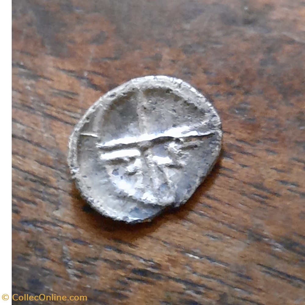 Marseille peri massaliete A/ Tete indigene a d R/Roue A M -100-50 D10.8 P0.47g Feugere OBP27 monnaie antique av jc ap gauloise marseille peri massaliete a tete indigene a d r roue a m 100 50 d10 8 p0 47g feugere obp27