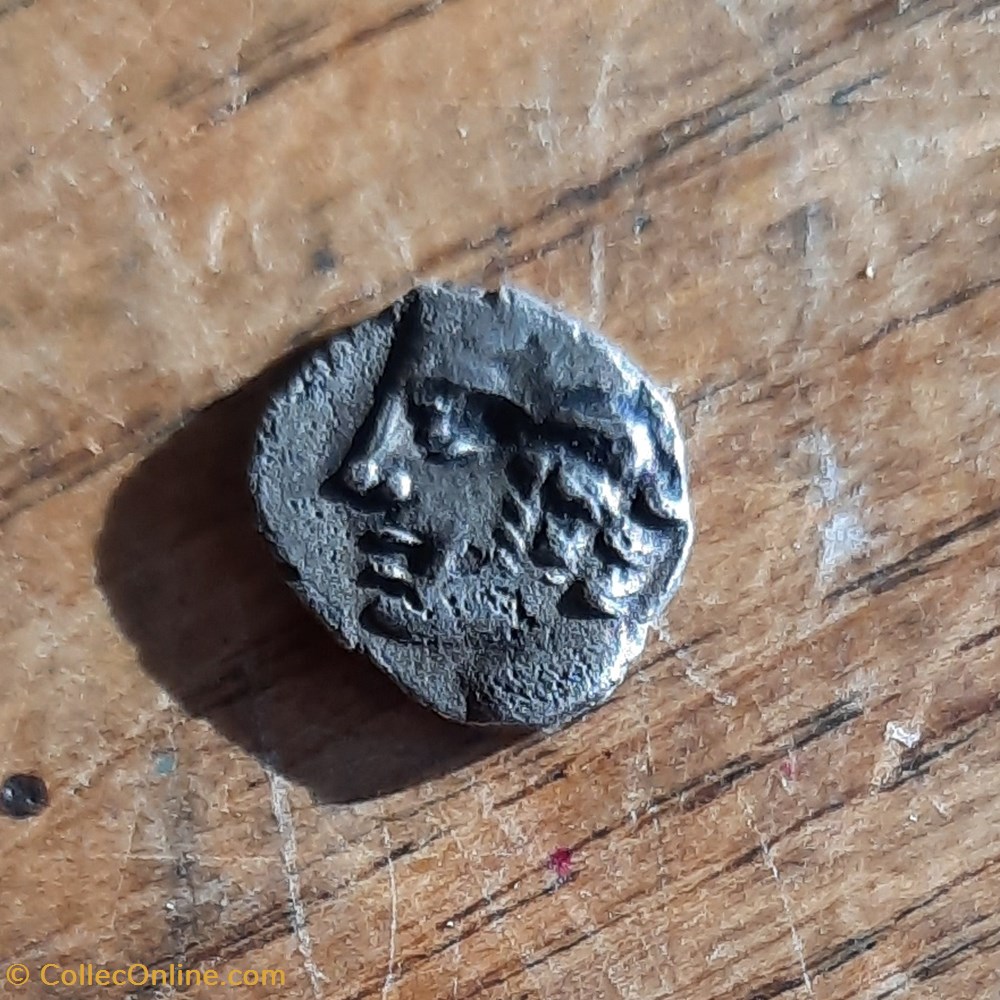 Marseille obol A/Tete Apollon a g R/Roue avec rayons -300-100 D10 P 0.60g Feugere OBM 10a monnaie antique jc gauloise marseille obol a tete apollon a g r roue avec rayons 300 100 d10 p 0 60g feugere obm 10a