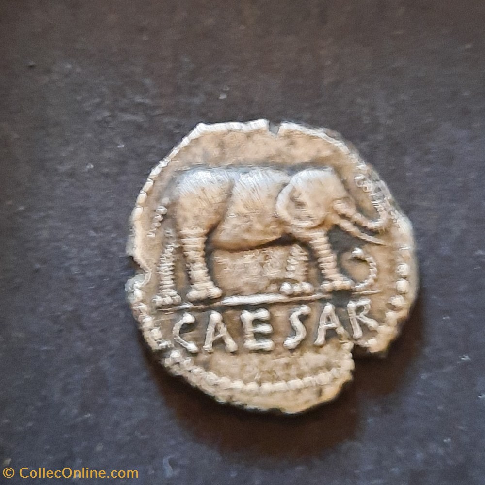 Jules Cesar A/Elephant a d CAESAR R/Instrument pontificaux D19.2 P 4.75g -49 RCV 1399 monnaie antique av jc ap romaine republicaine imperiale jules cesar a elephant a d caesar r instrument pontificaux d19 2 p 4 75g 49 rcv 1399