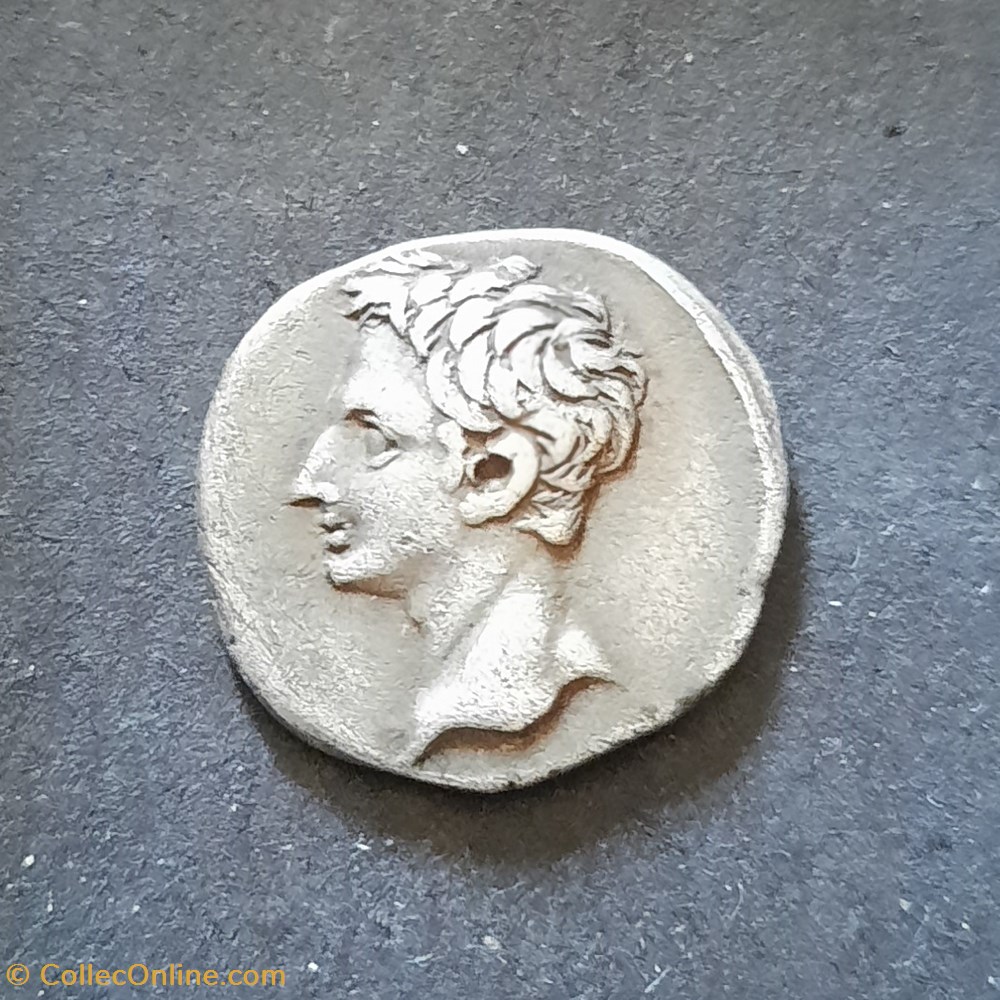 Auguste A/ Tete nue Auguste a g R/ Capricorne a d AUGUSTUS exergue -19-18 D18.6 P3.62g RCV 1592 monnaie antique av jc romaine republicaine imperiale auguste a tete nue auguste a g r capricorne a d augustus exergue 19 18 d18 6 p3 62g rcv 1592