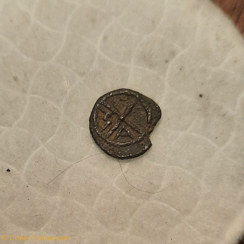 monnaie antique av jc ap gauloise provence imit marseille obole a tete a g r roue ma 75 25 d11 3 p0 62 feugere obp2 3