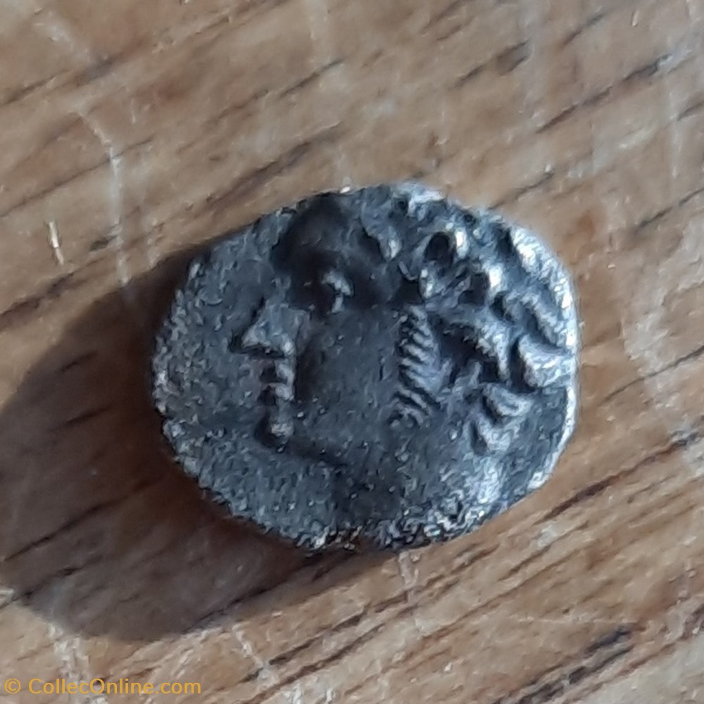 Marseille Obole A/Tete Apollon a g R/ Roue a 4 rayons D9 P0.51g Feugere OBM 10b monnaies antiques celtes marseille obole a tete apollon a g r roue a 4 rayons d9 p0 51g feugere obm 10b
