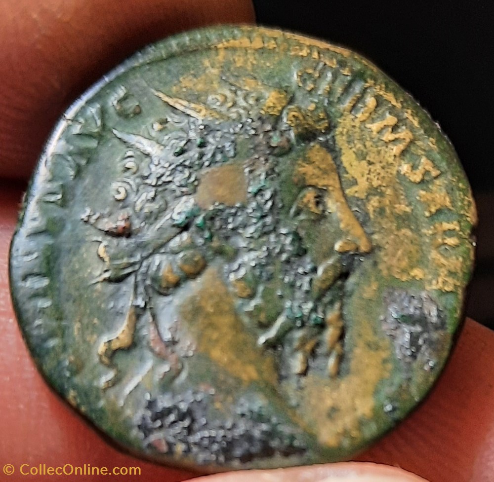 monnaie antiquite av jc ap romaine republicaine imperiale marc aurele a tete radiee a d r trophee d armes d23 8 p 11 47g c 157 rcv 5024 ric1179