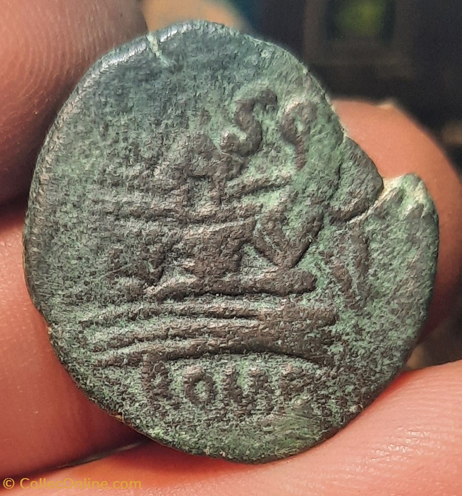 monnaies antiquite av jc ap romaines republicaines imperiales republique romaine a tete lauree de saturne a d r proue et ancre 211 206 d27 p16 20g rcv767rrc 50 4