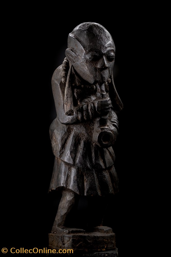 Inconnu qui fume art antiquite africain statuette inconnu qui fume
