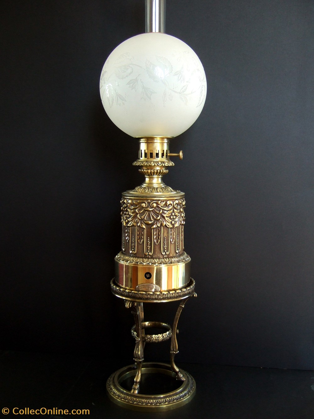 Lampe à huile à mouvement d'horlogerie art antiquites eclairage ancien lampe a huile a mouvement horlogerie