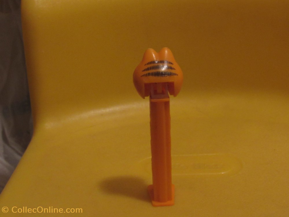 Garfield Cheesy Grin Pez Dispenser board games toys garfield cheesy grin pez dispenser