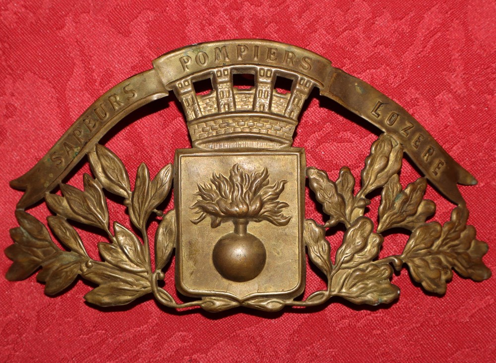 militaria casques coiffures plaque frontale de casque de pompier de lozere