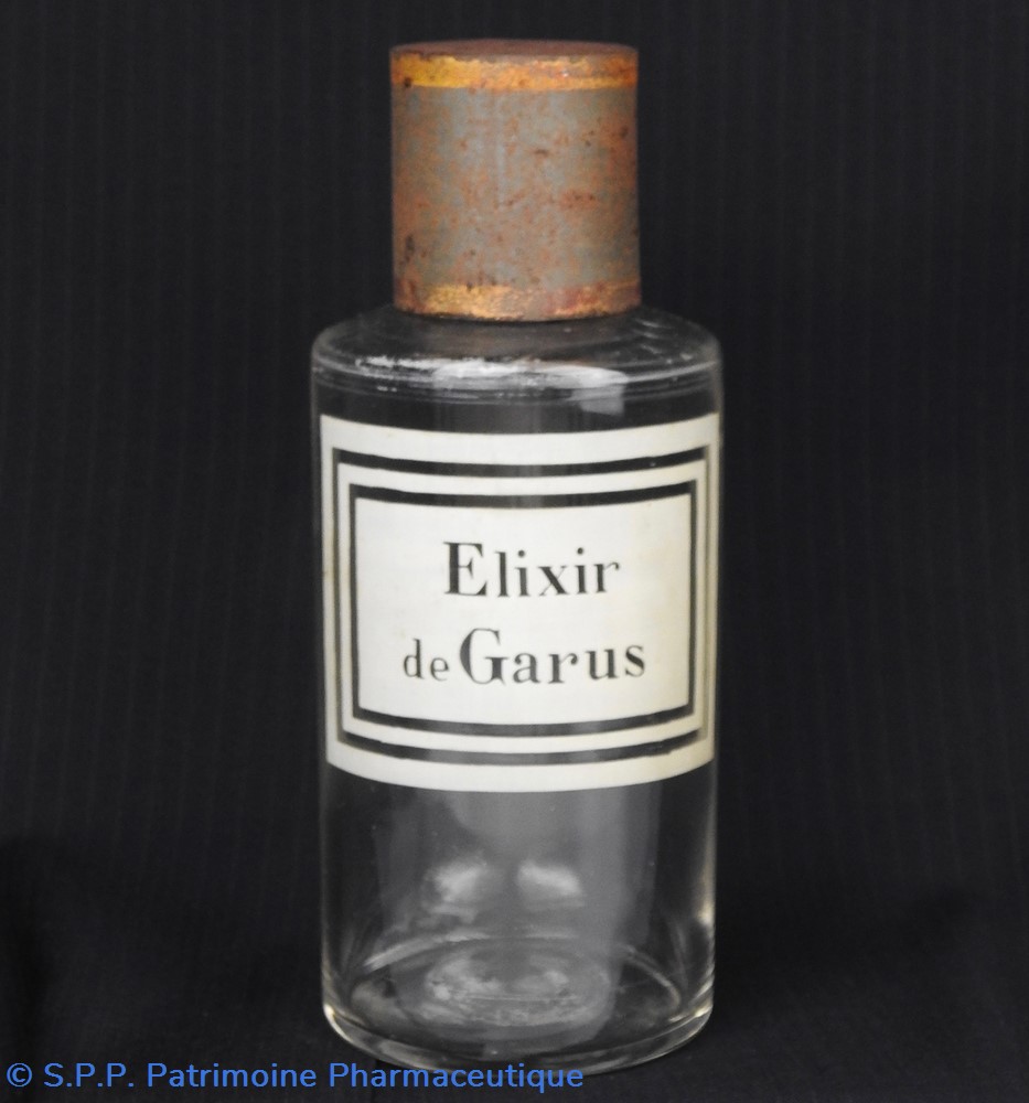 Flacon en verre petit modèle étiquette blanche Pharmacie RAVASSE science flacon en verre petit modele etiquette blanche pharmacie ravasse