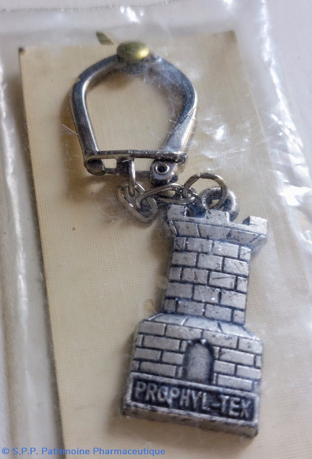 PROPHYLTEX - TEX Porte- clefs / Donjon 2 objets publicitaires prophyltex tex porte clefs donjon