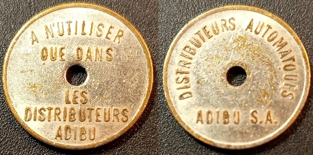 b- Jeton Distributeurs automatiques ADIBU S.A. fautée monnaies paranumismatique jetons poids b jeton distributeurs automatiques adibu s a fautee