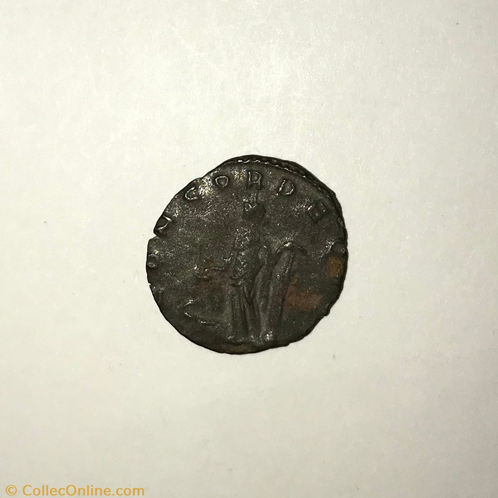 monnaie antique jc ap romaine republicaine imperiale postume la concorde debout a gauche avec gouvernail