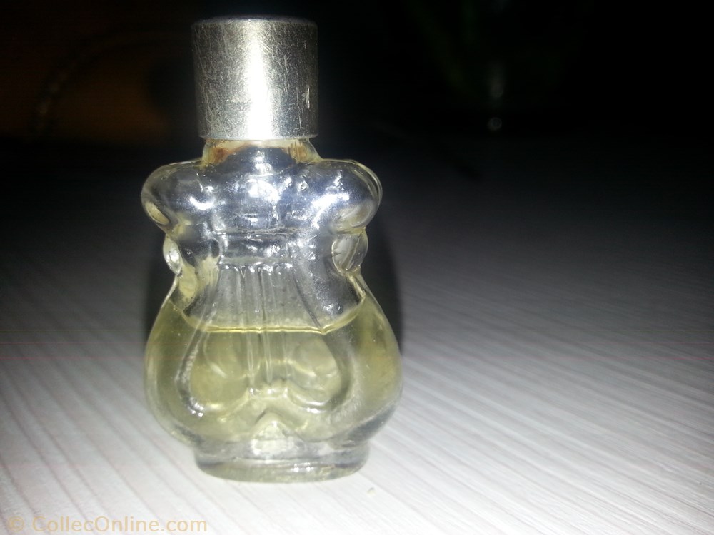 parfum beaute miniature dana tabu en forme de violon bouchon dore