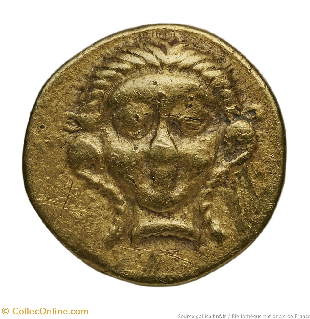 Quart à la tête de face et aux dauphins monnaies antiques av jc ap celtes quart a la tete de face et aux dauphins