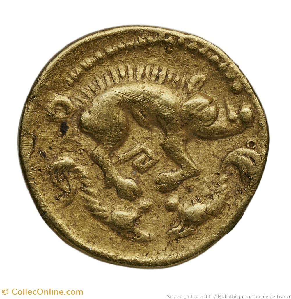 Quart à la tête de face et aux dauphins monnaies antiques av jc ap celtes quart a la tete de face et aux dauphins