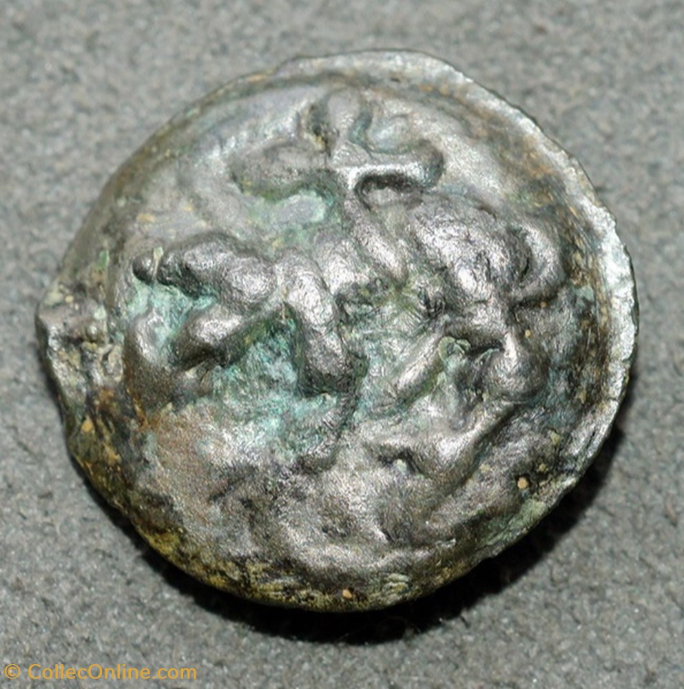 Potin à la tête diabolique et au loup monnaie antique av jc ap gauloise potin a la tete diabolique et au loup