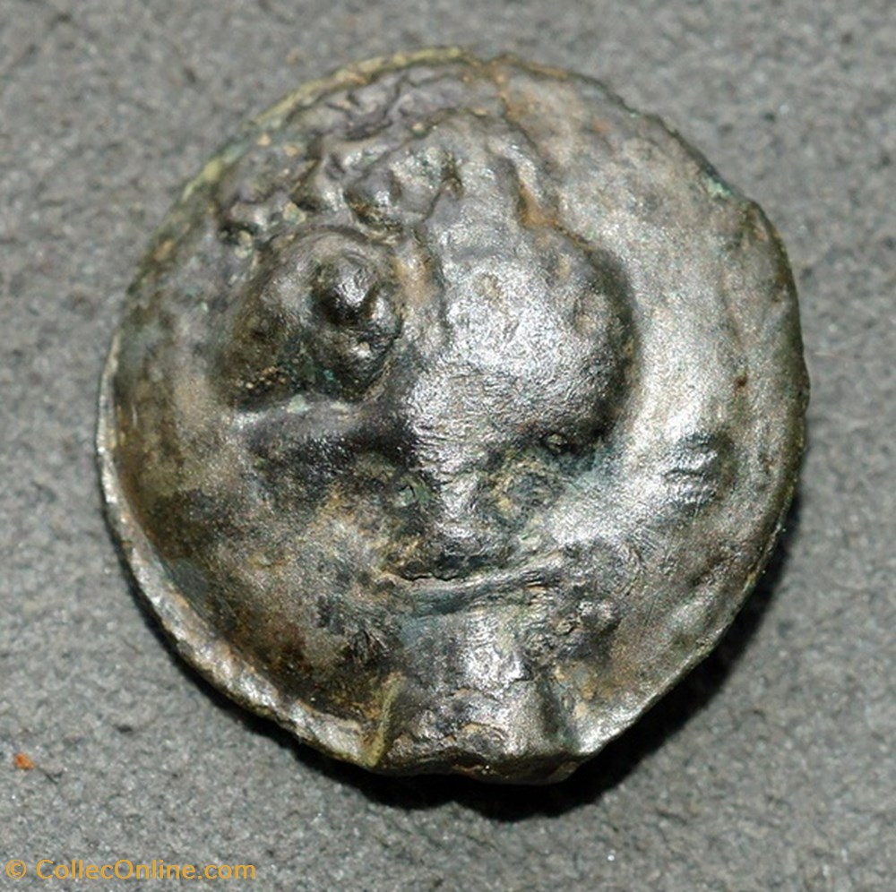 Potin à la tête diabolique et au loup monnaie antique av jc ap gauloise potin a la tete diabolique et au loup