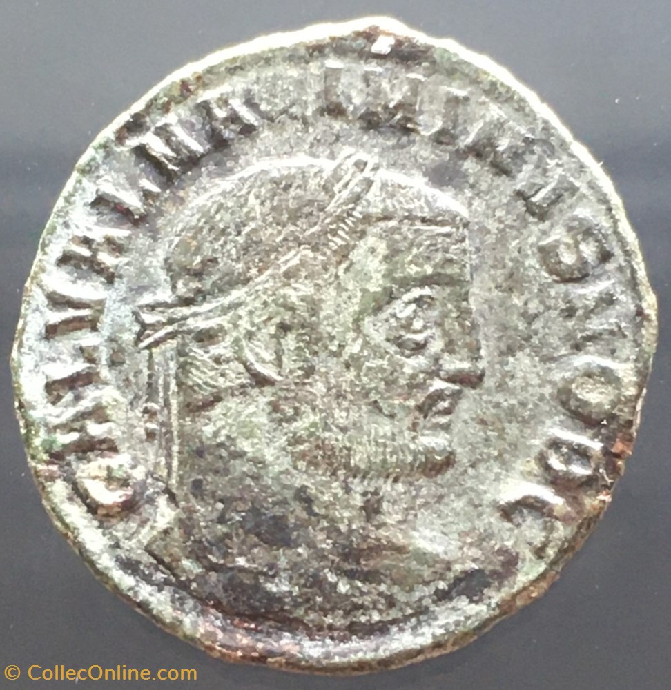 Follis de Maximin II Daia - GENIO CAESARIS / ETOILE / DELTA / SM.TS monnaies antiquite av jc ap romaines republicaines imperiales follis de maximin ii daia genio caesaris etoile delta sm ts