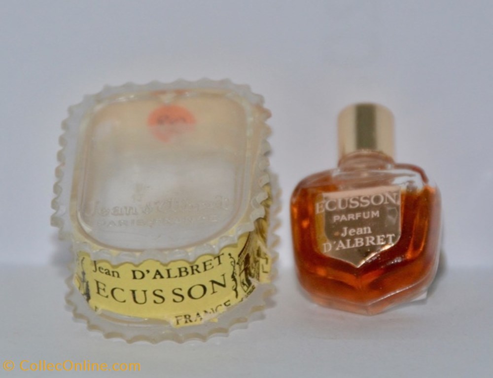 ALBRET Jean d'. - Écusson parfums beaute miniatures albret jean ecusson