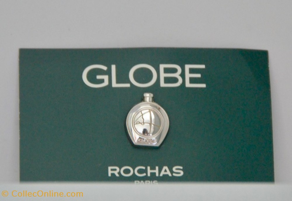 ROCHAS Marcel - Globe Pin's parfums beaute miniatures rochas marcel globe pin s