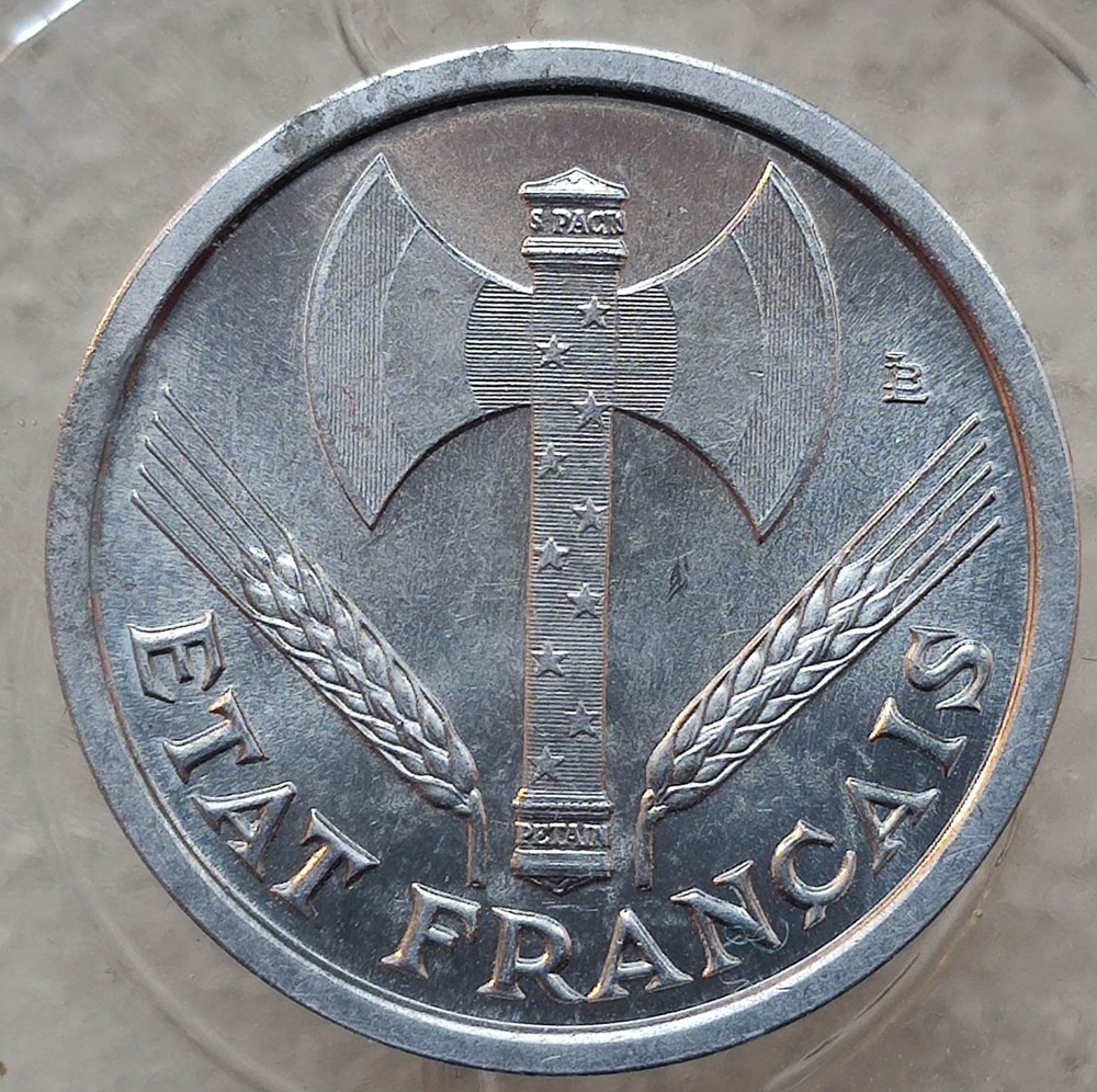 1 franc 1942 première frappe aux croix dans les globules monnaies monde france 1 franc 1942 premiere frappe aux croix dans les globules