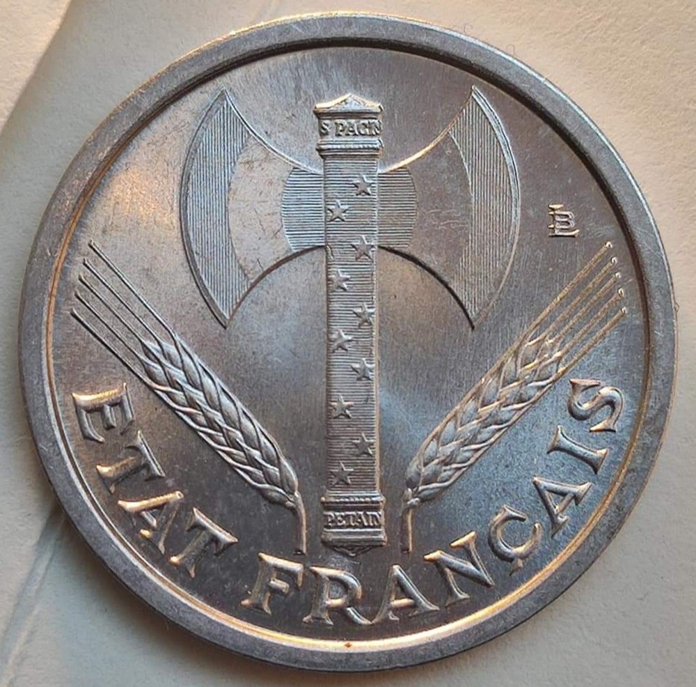 1 franc 1942 première frappe aux croix dans les globules MS65 monnaies monde france 1 franc 1942 premiere frappe aux croix dans les globules ms65