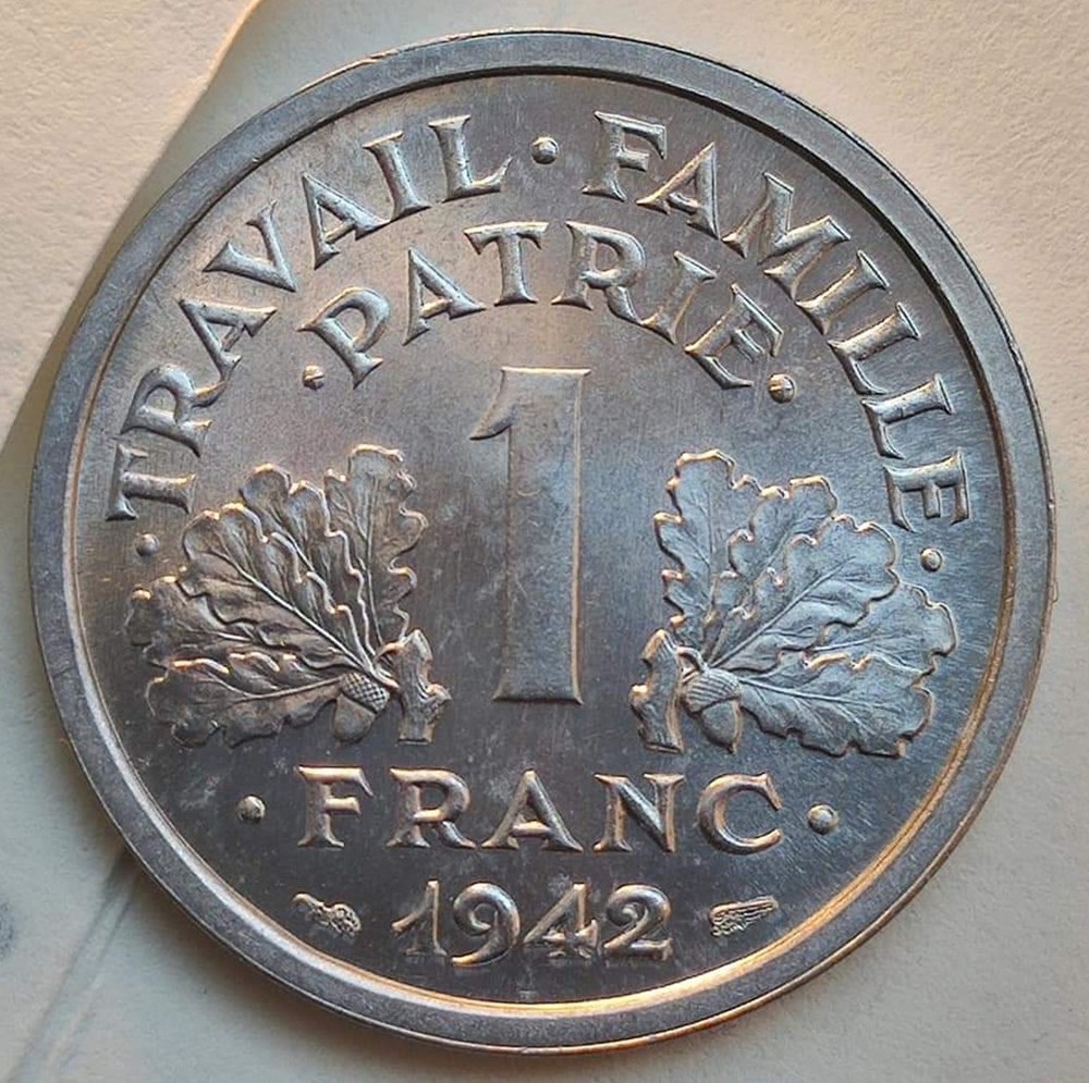 1 franc 1942 première frappe aux croix dans les globules MS65 monnaies monde france 1 franc 1942 premiere frappe aux croix dans les globules ms65
