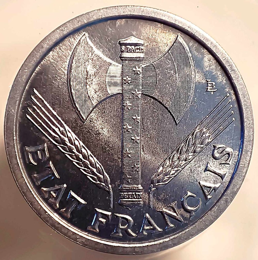 1 franc 1942 première frappe aux croix dans les globules MS65 monnaies monde france 1 franc 1942 premiere frappe aux croix dans les globules ms65