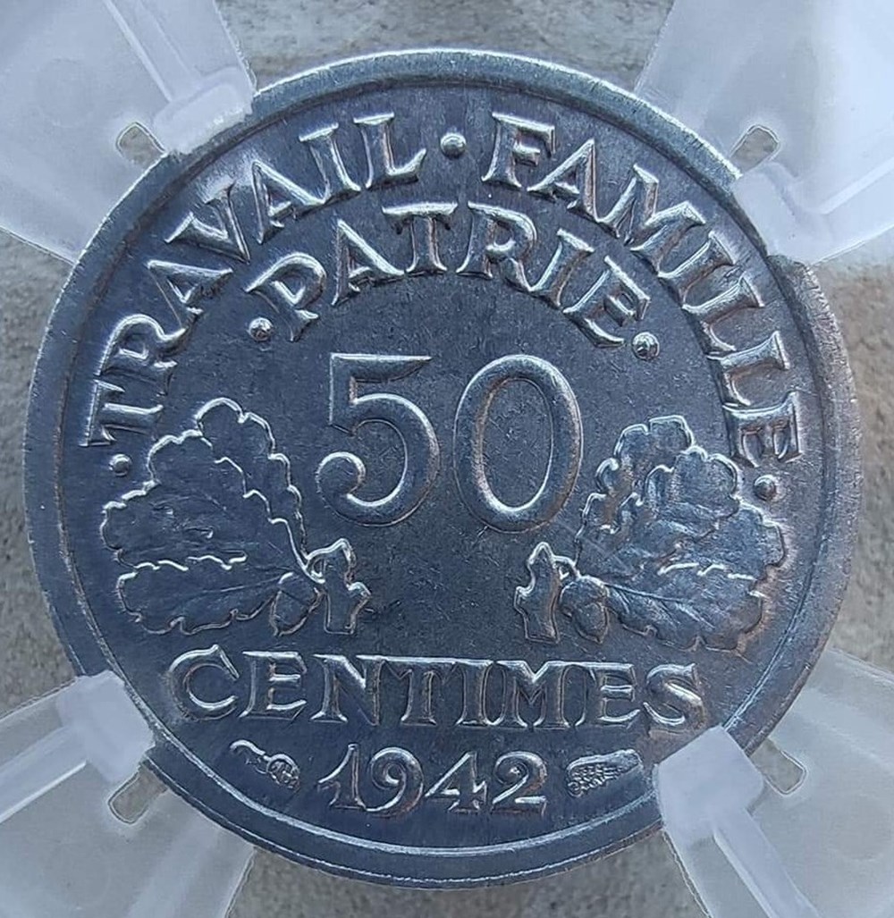 50 centimes 1942 première frappe aux croix dans les globules MS65 monnaies monde france 50 centimes 1942 premiere frappe aux croix dans les globules ms65