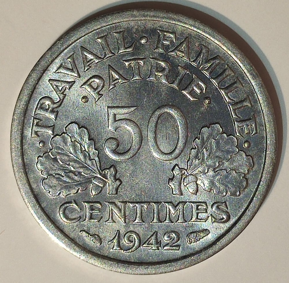 50 centimes 1942 première frappe aux croix dans les globules SP64 monnaies monde france 50 centimes 1942 premiere frappe aux croix dans les globules sp64