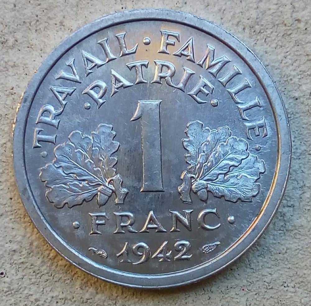 1 franc 1942 première frappe aux croix dans les globules monnaies monde france 1 franc 1942 premiere frappe aux croix dans les globules
