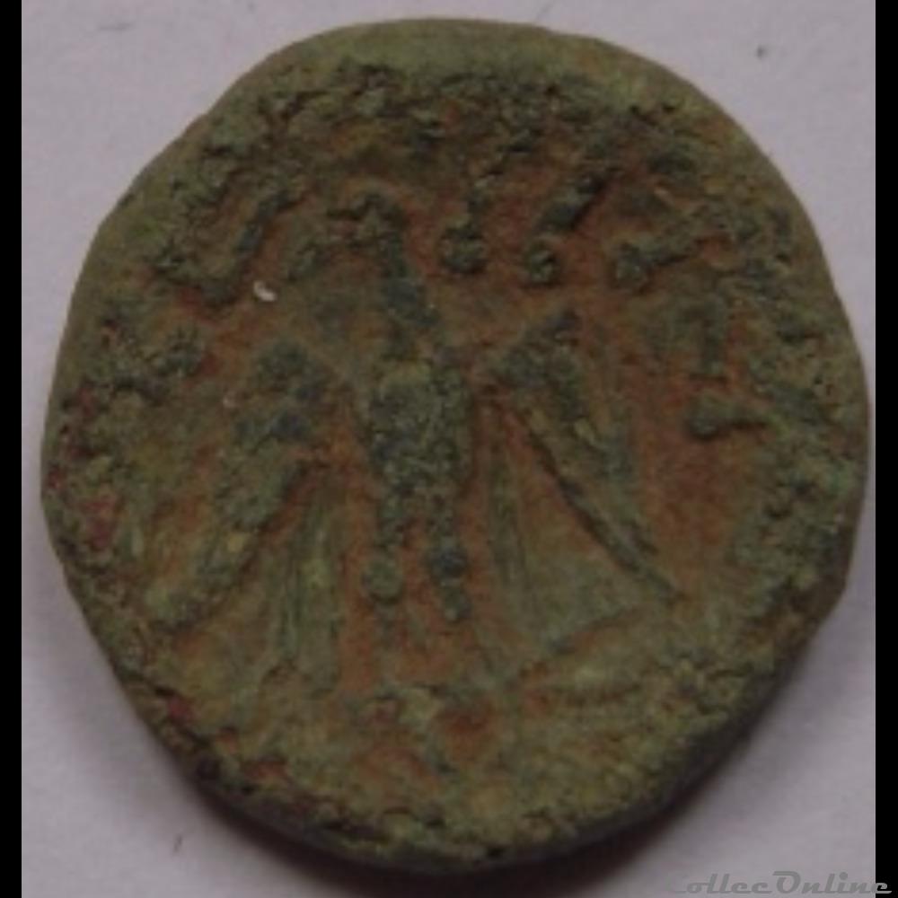 Série 989 DT 3276 Bronze SECISCV à la tête de face monnaie antique gauloise serie 989 dt 3276 bronze seciscv a la tete de face