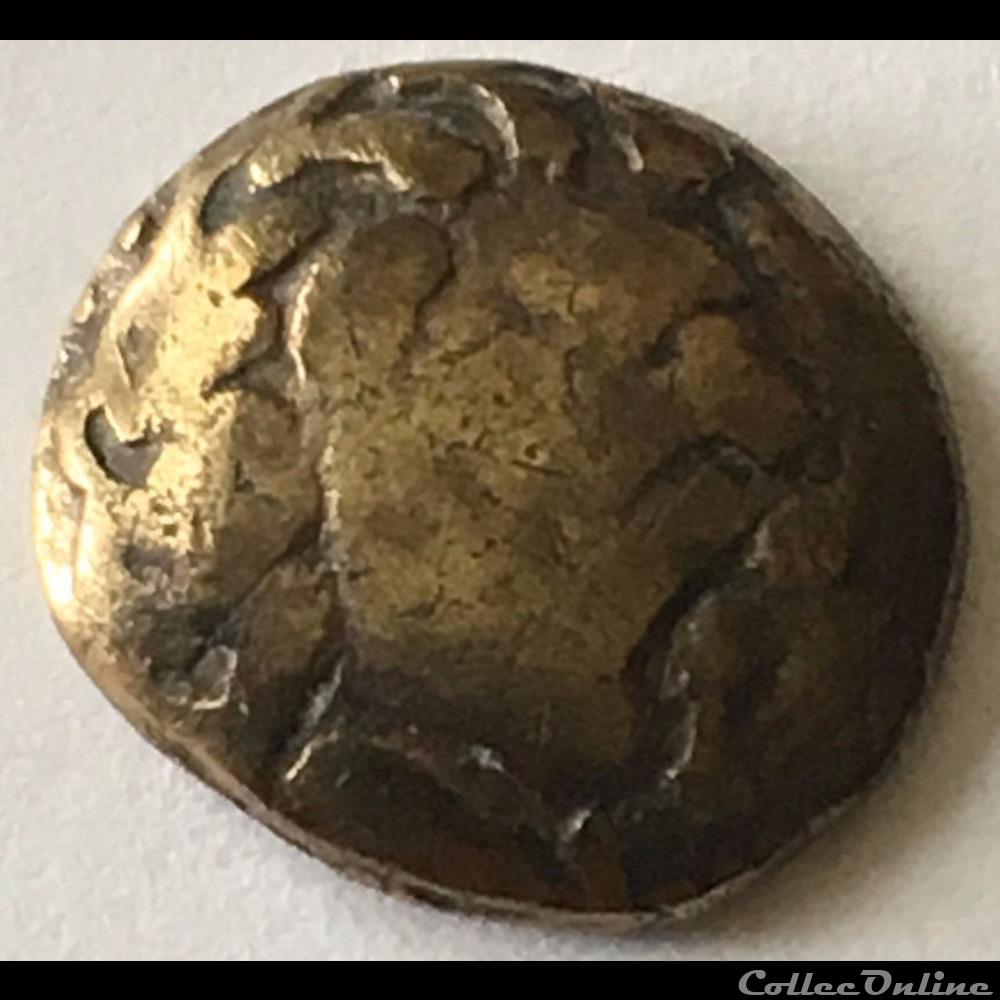 Série 875 DT3181 var quart de statère au triskèle type de Chenôves tête à droite monnaie antique gauloise serie 875 dt3181 var quart de statere au triskele type de chenoves tete a droite