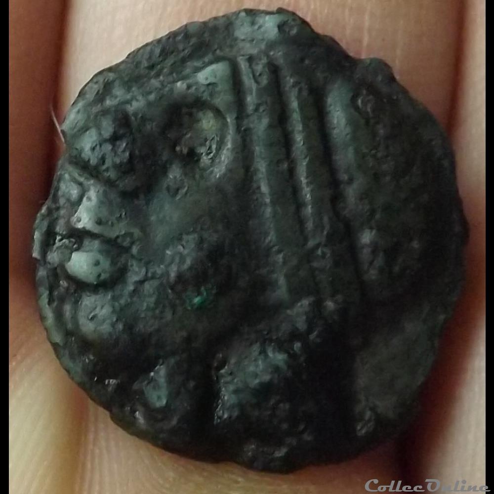 monnaie antique gauloise serie 854 dt potin au bandeau et a la tete negroide