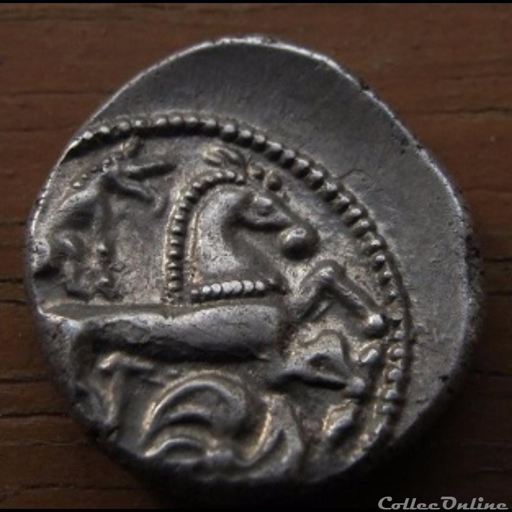 Série 1040 DT 3362 Drachme au loup et au triskele monnaie antique gauloise serie 1040 dt 3362 drachme au loup et au triskele