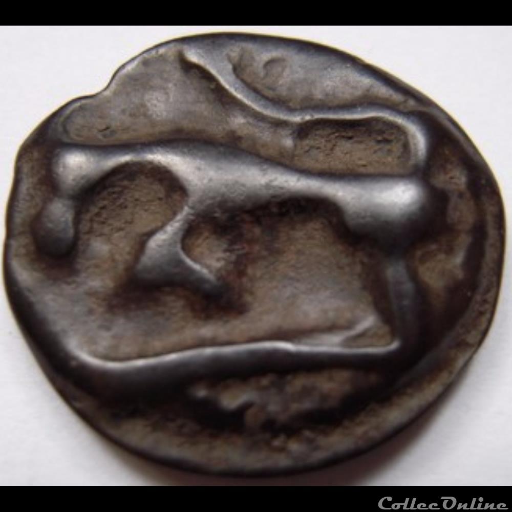 monnaie antique gauloise serie 854 dt potin au bandeau et a la tete negroide