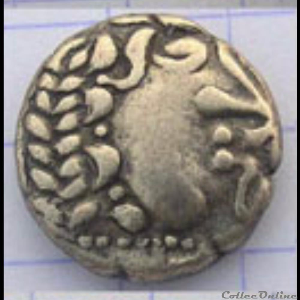 Série 815 DT 3042 quart de statère du type de Beaune au triskèle monnaie antique gauloise serie 815 dt 3042 quart de statere du type de beaune au triskele