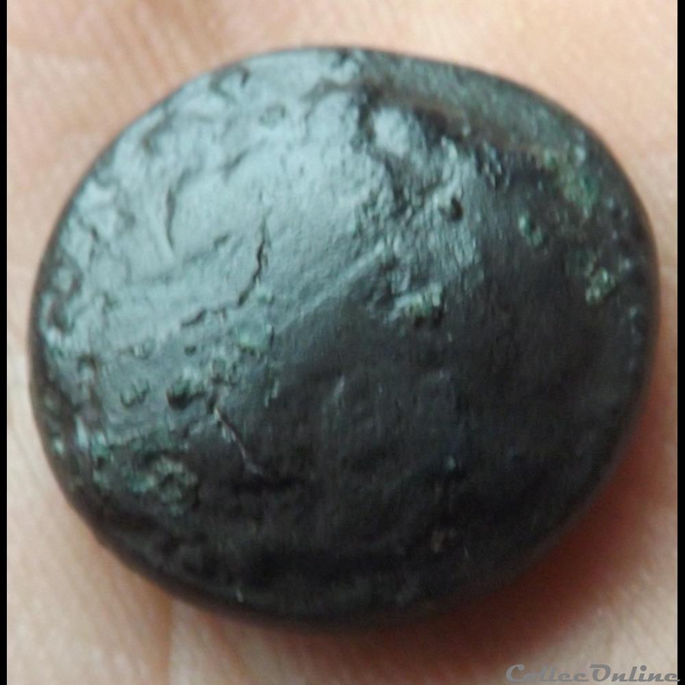 monnaie antique gauloise serie 875 statere en bronze du type de chenove aux triskele