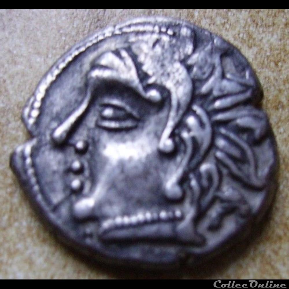 Série 1040 DT 3362 Drachme au loup et au triskele monnaie antique gauloise serie 1040 dt 3362 drachme au loup et au triskele