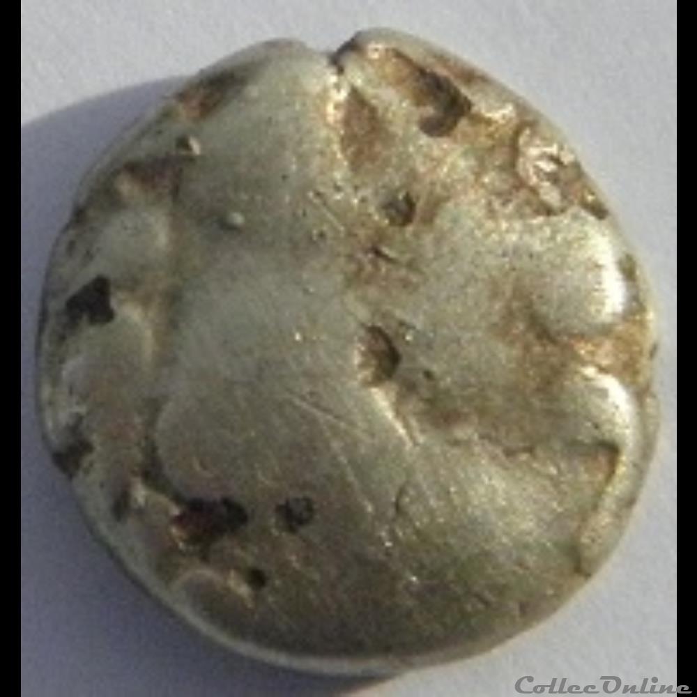 Série 875 DT 3180 1/4 de statère du type de Chenôve à la rouelle tête à gauche monnaie antique gauloise serie 875 dt 3180 1 4 de statere du type de chenove a la rouelle tete a gauche