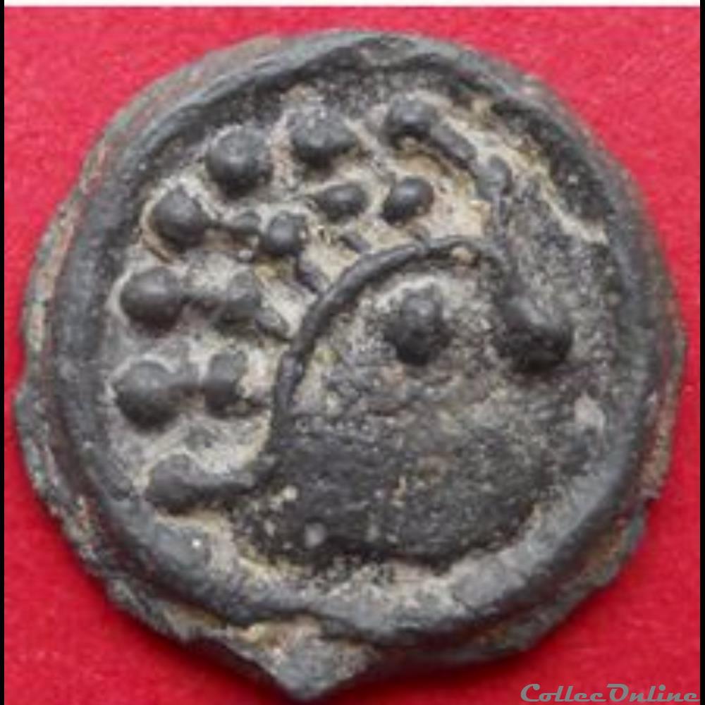 Série 559 DT 2642 Potin à la tête d'indien stylisé monnaie antique gauloise serie 559 dt 2642 potin a la tete indien stylise